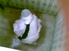 indian school girl peeing in toilet